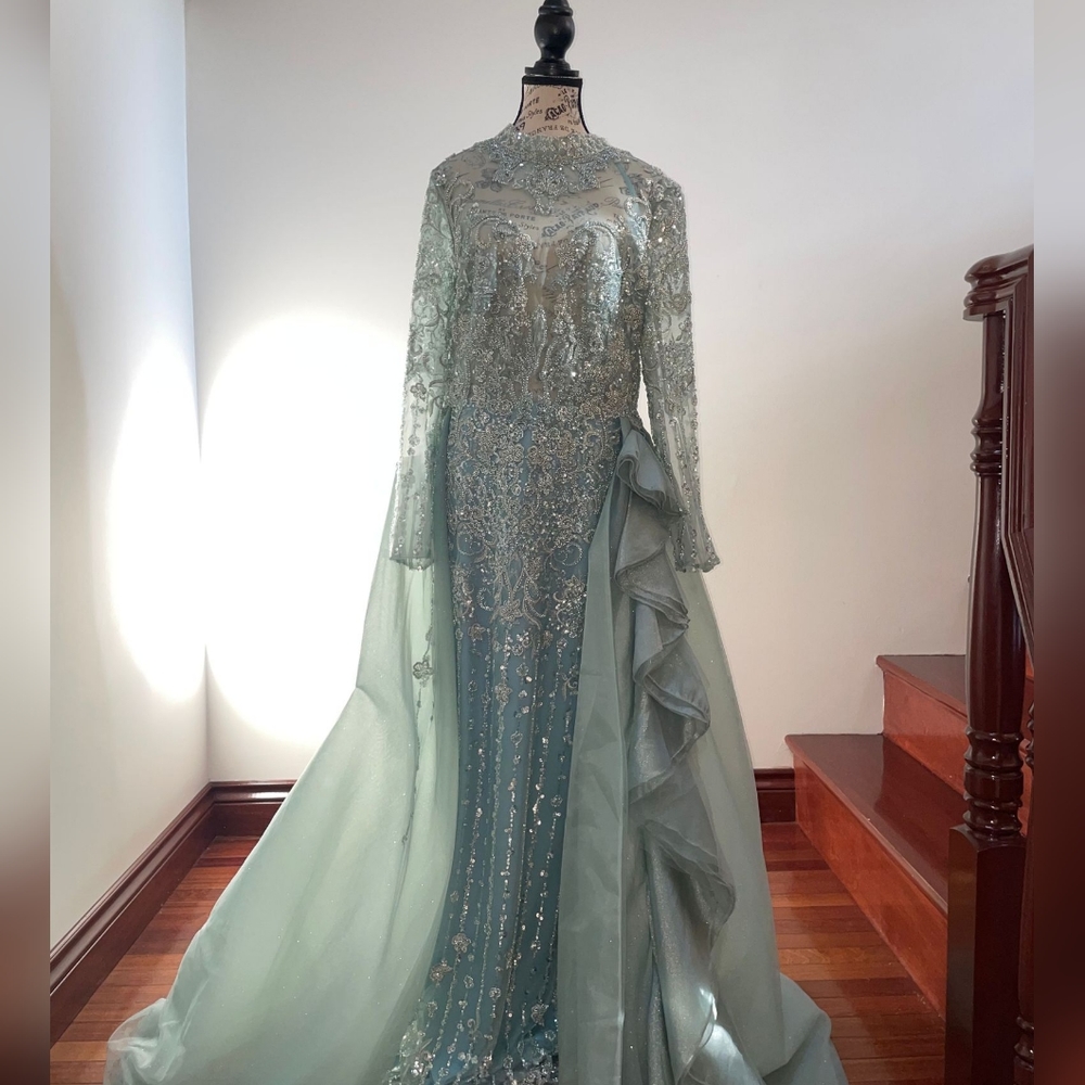 Evening gown size 16. Very well made and unique.